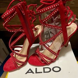 Aldo red high heels size 8.